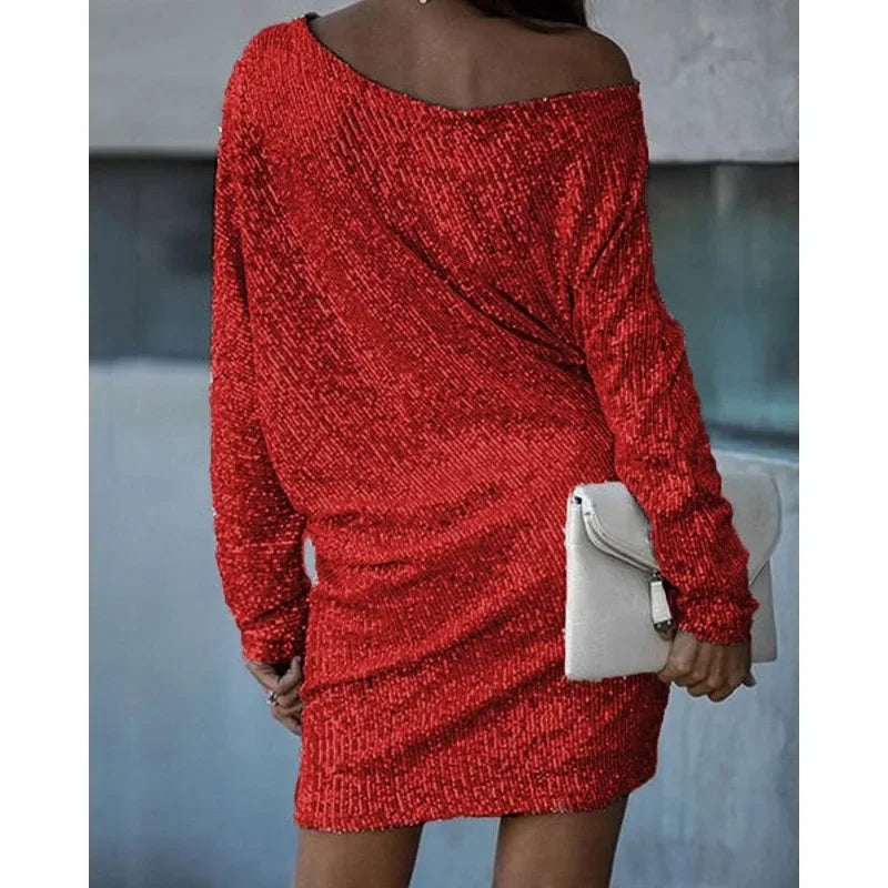 Alana - Glitrende off-shoulder kjole med sequin-detaljer