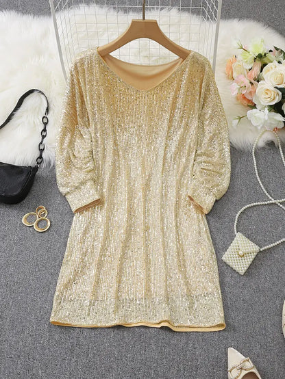 Alana - Glitrende off-shoulder kjole med sequin-detaljer