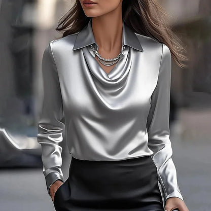 Tove | Elegant glitrende bluse med dyb v-hals