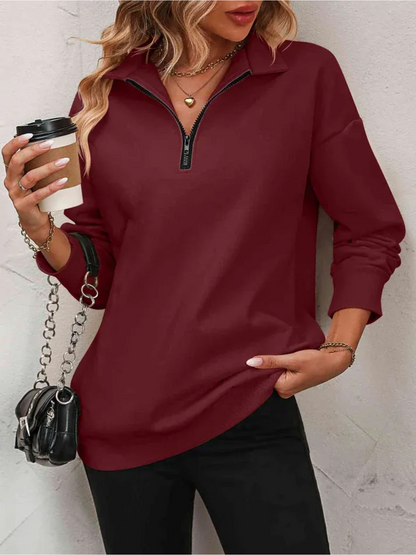 Sweatshirt med lynlås og hængende skulder til kvinder