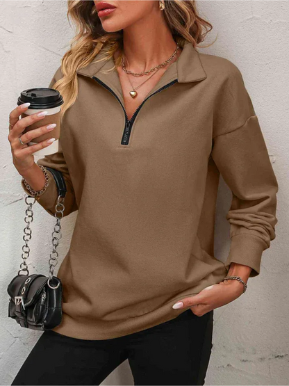 Sweatshirt med lynlås og hængende skulder til kvinder