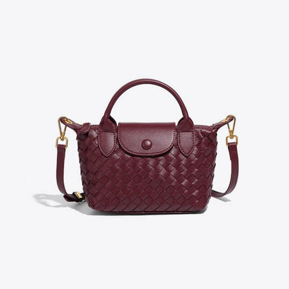 Athena - Kompakt crossbody-taske med vævet tekstur