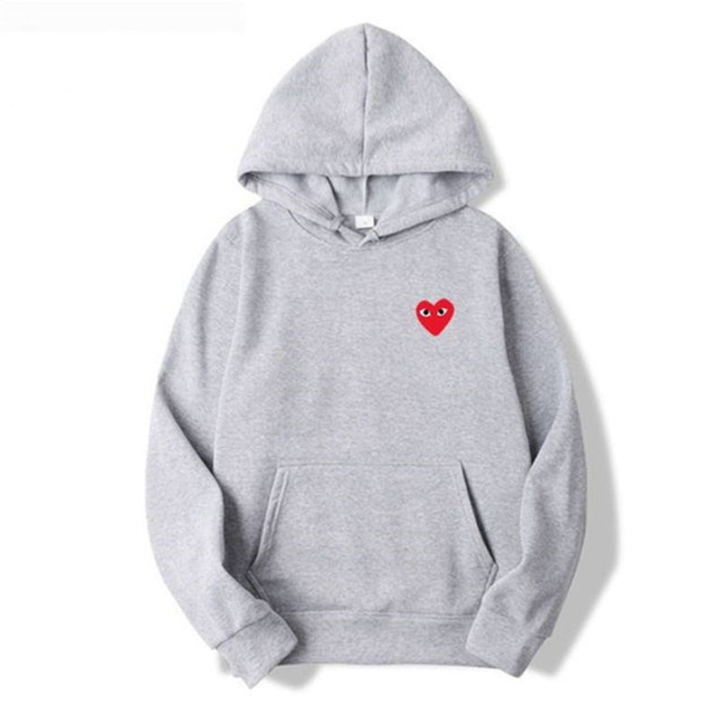 Cecilie | Afslappet hoodie med hjerteprint, kapuchon og kængurulomme