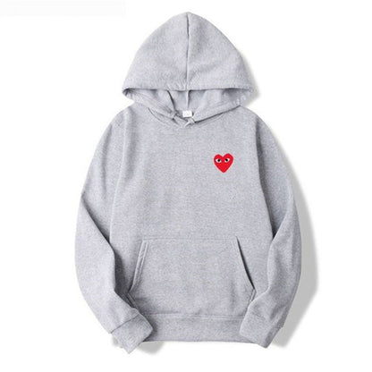Cecilie | Afslappet hoodie med hjerteprint, kapuchon og kængurulomme
