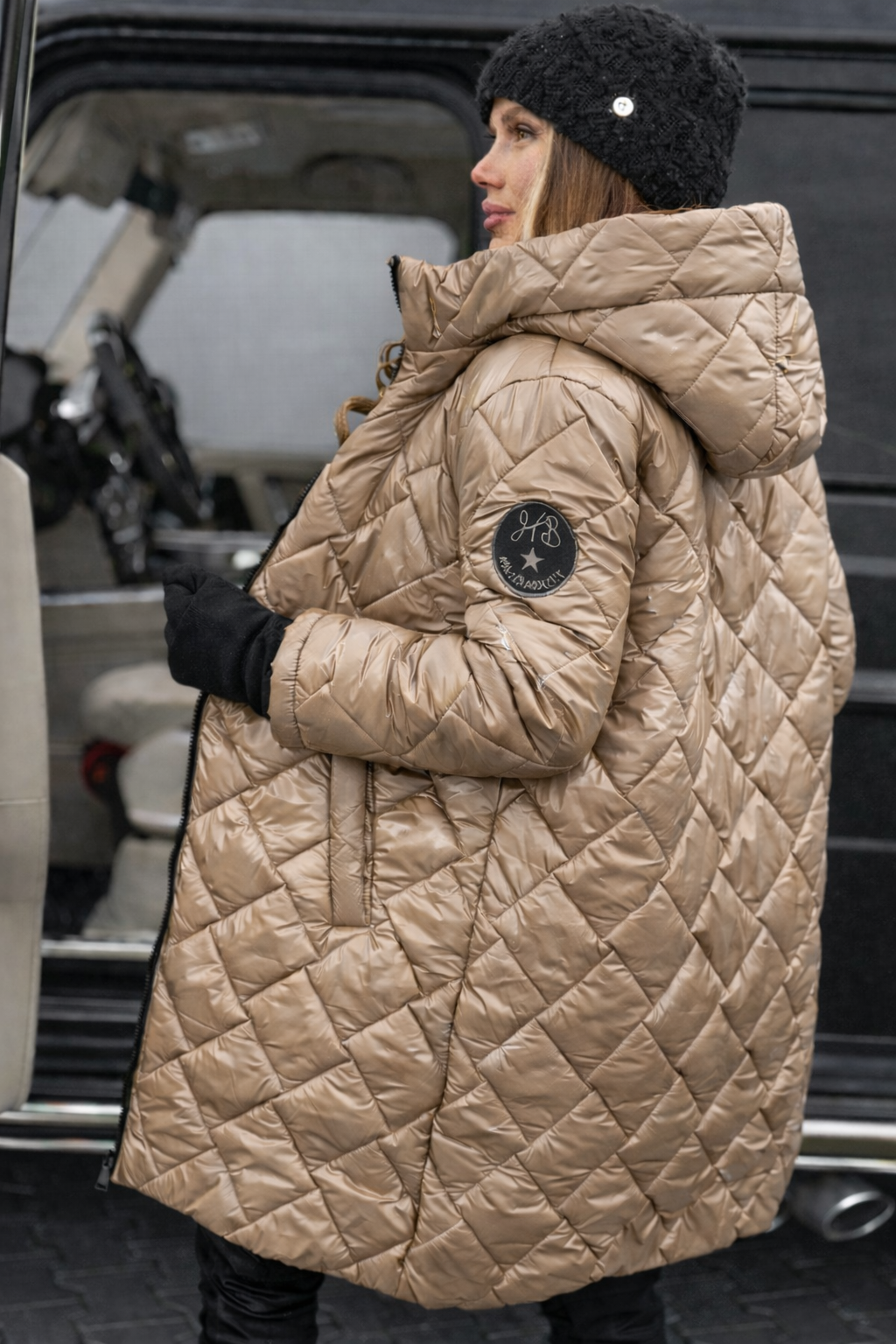 Malene | Langlinjet hætte puffer jakke med quiltning til vinter