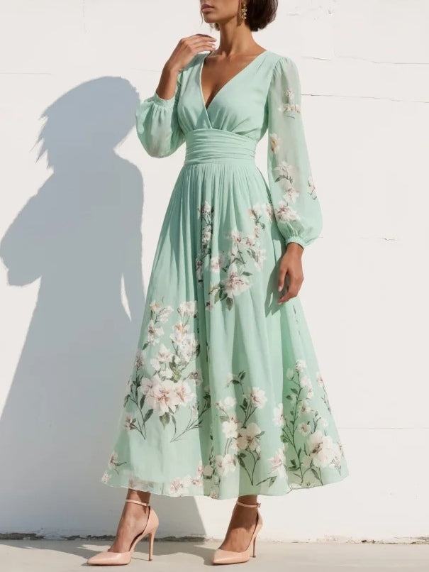 Camilla | Blomstret midi kjole med lange ærmer og plisseret nederdel