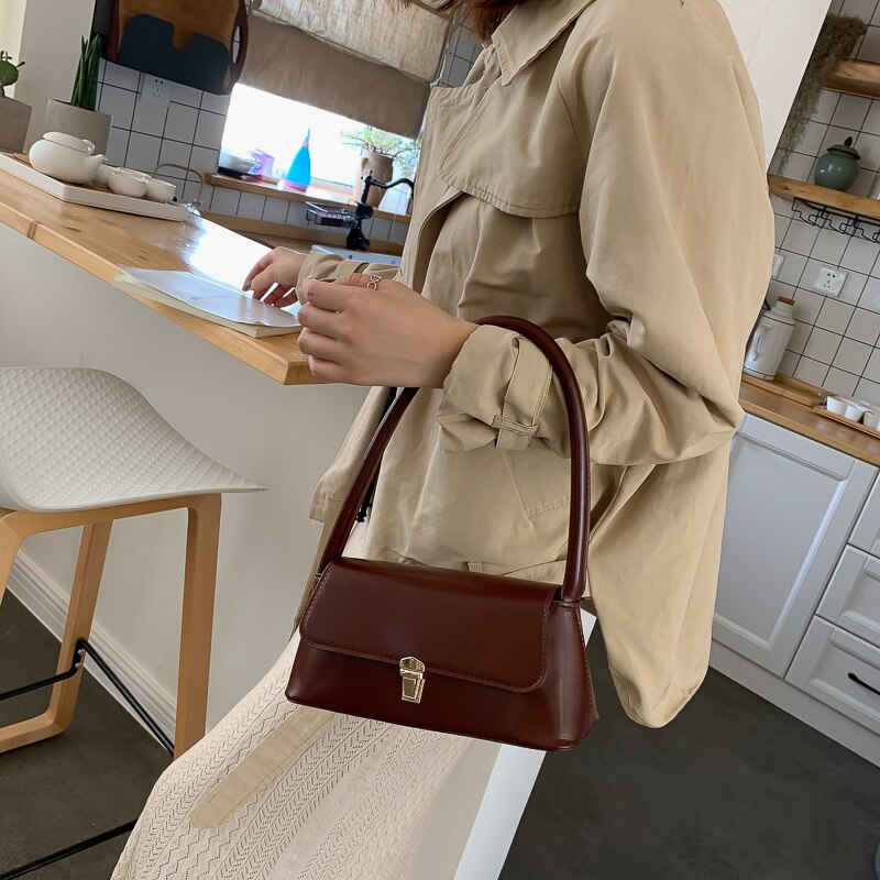 Cressida - Vintage skuldertaske med gyldne detaljer