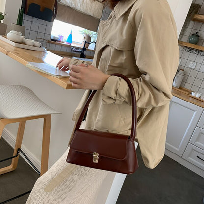 Cressida - Vintage skuldertaske med gyldne detaljer