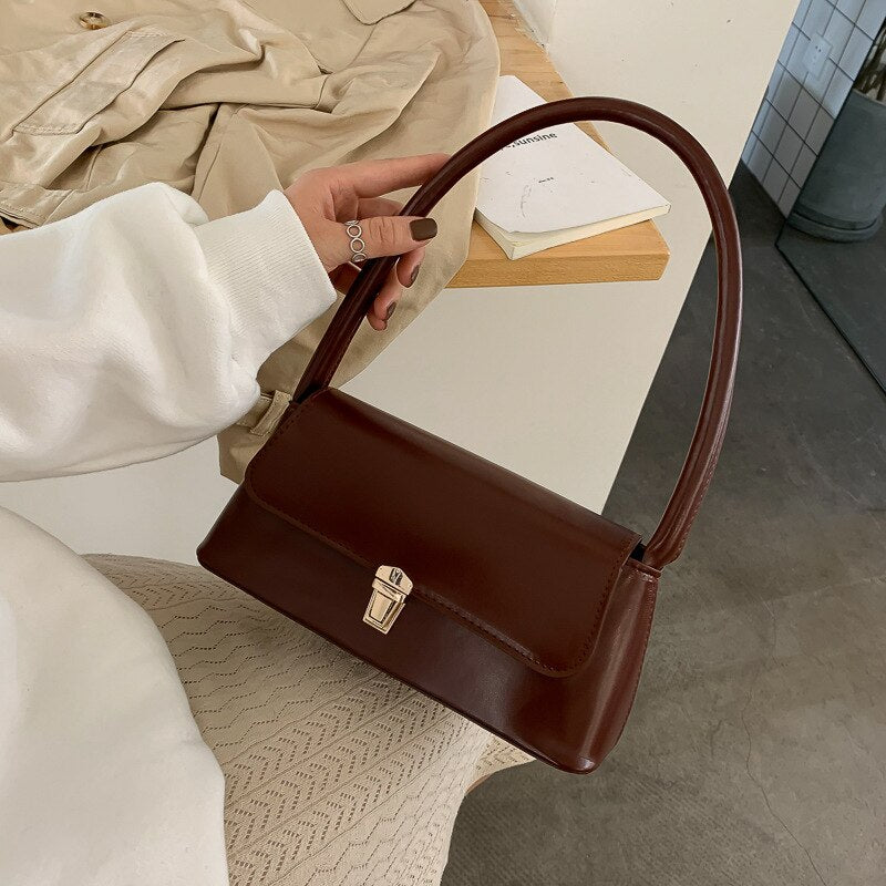 Cressida - Vintage skuldertaske med gyldne detaljer
