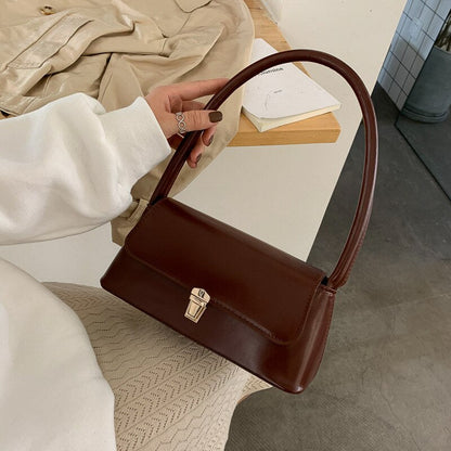 Cressida - Vintage skuldertaske med gyldne detaljer